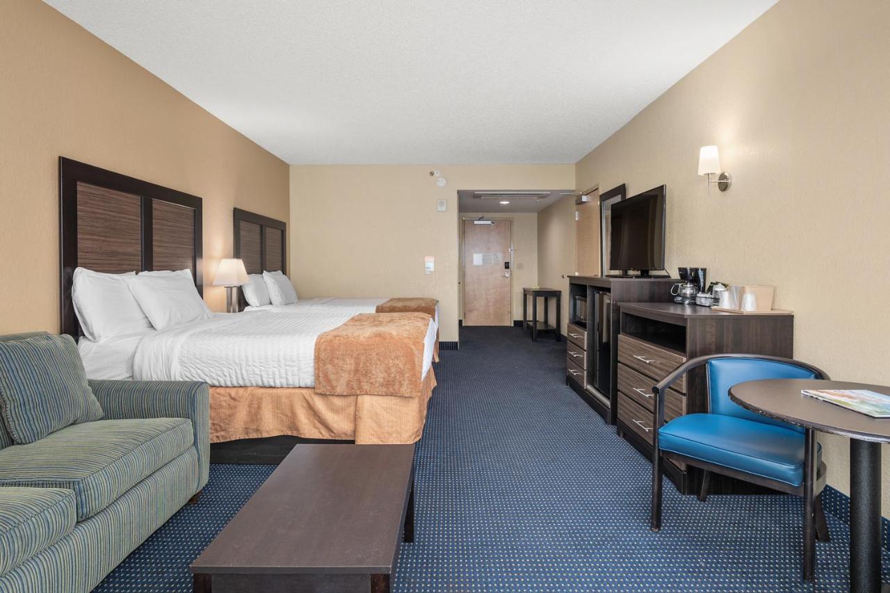 Queen Room with Two Queen Beds and Sofa - Partial Ocean View at Crystal Beach Hotel