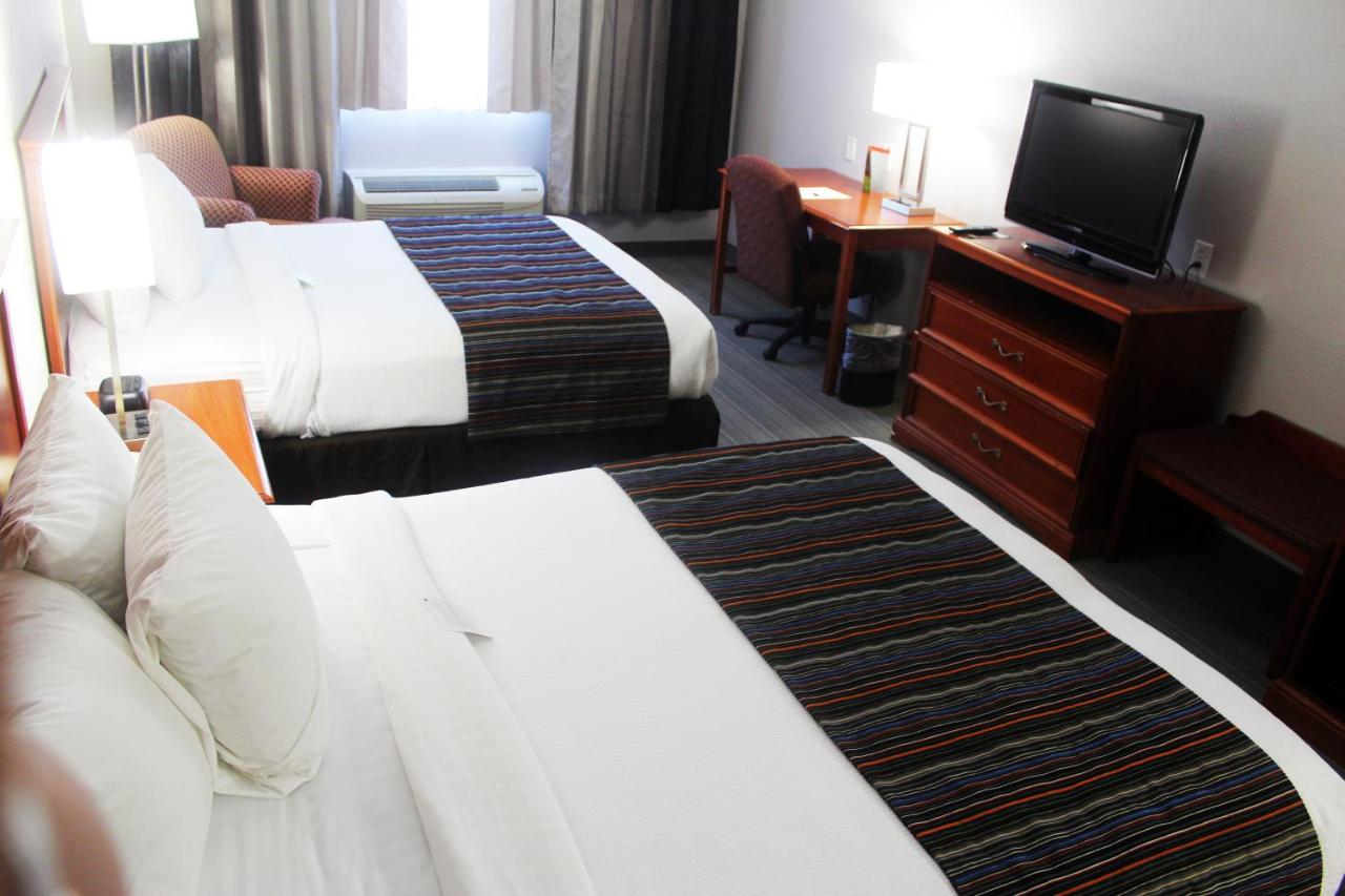 Queen Room with Two Queen Beds - Non-Smoking at Country Inn & Suites by Radisson, San Antonio Lackland AFB - SeaWorld Area