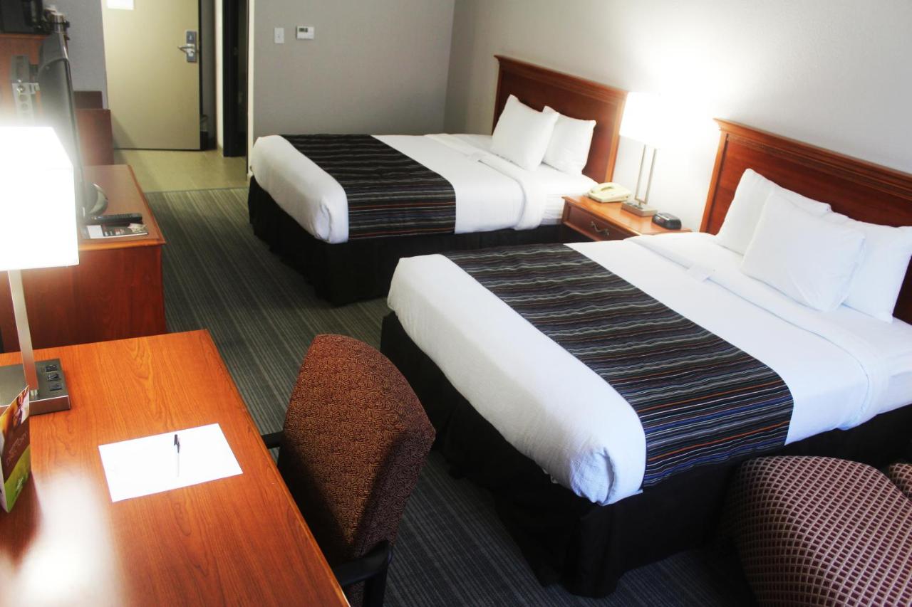 Queen Room with Two Queen Beds - Non-Smoking at Country Inn & Suites by Radisson, San Antonio Lackland AFB - SeaWorld Area