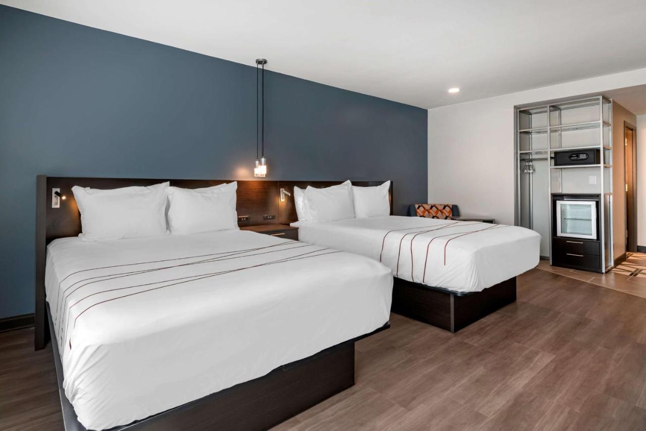 Queen Room with Two Queen Beds and Bath Tub - Disability Access at Vīb Hotel by Best Western Denver RiNo