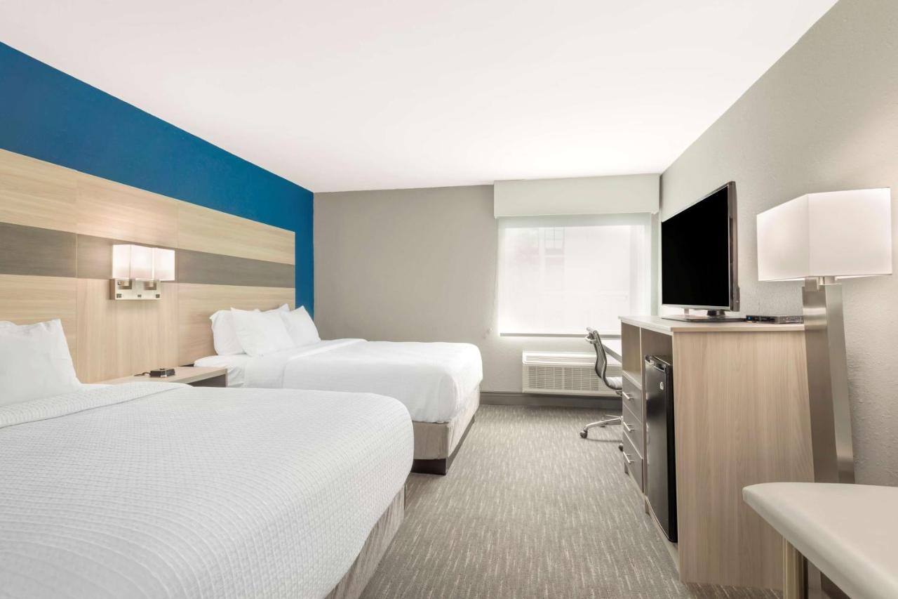 Queen Room with Two Queen Beds at Best Western Plus Cleveland Inn & Suites