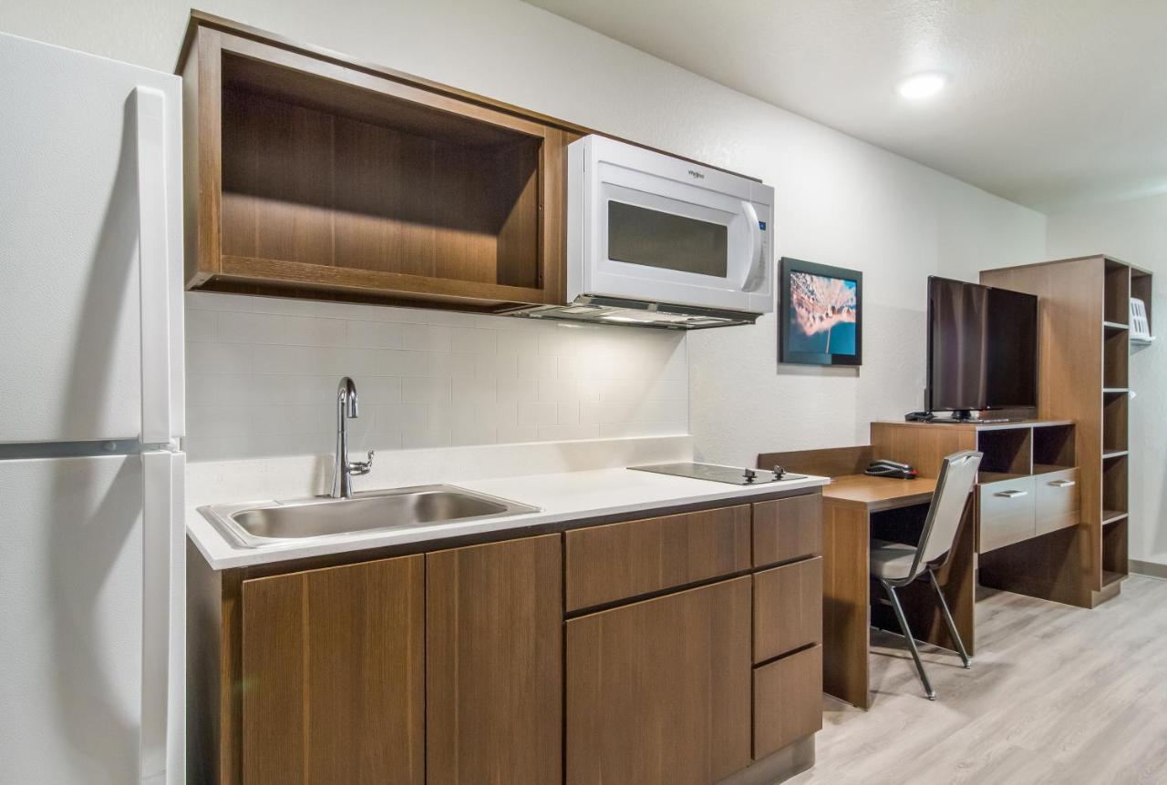 Queen Suite with Full Kitchen/Non Smoking at WoodSpring Suites Greensboro - High Point North