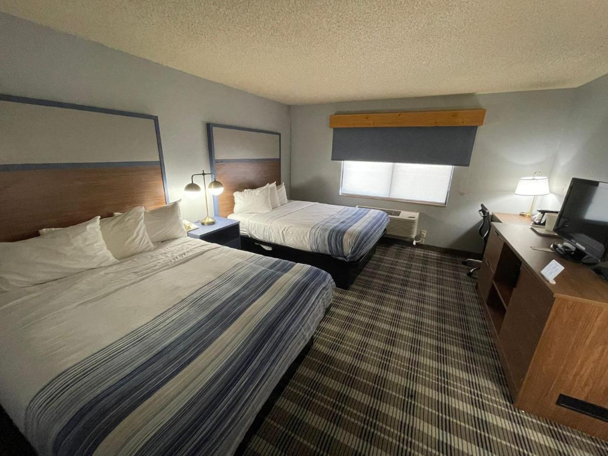 Queen Room with Two Queen Beds - Non-Smoking at AmericInn by Wyndham Sayre