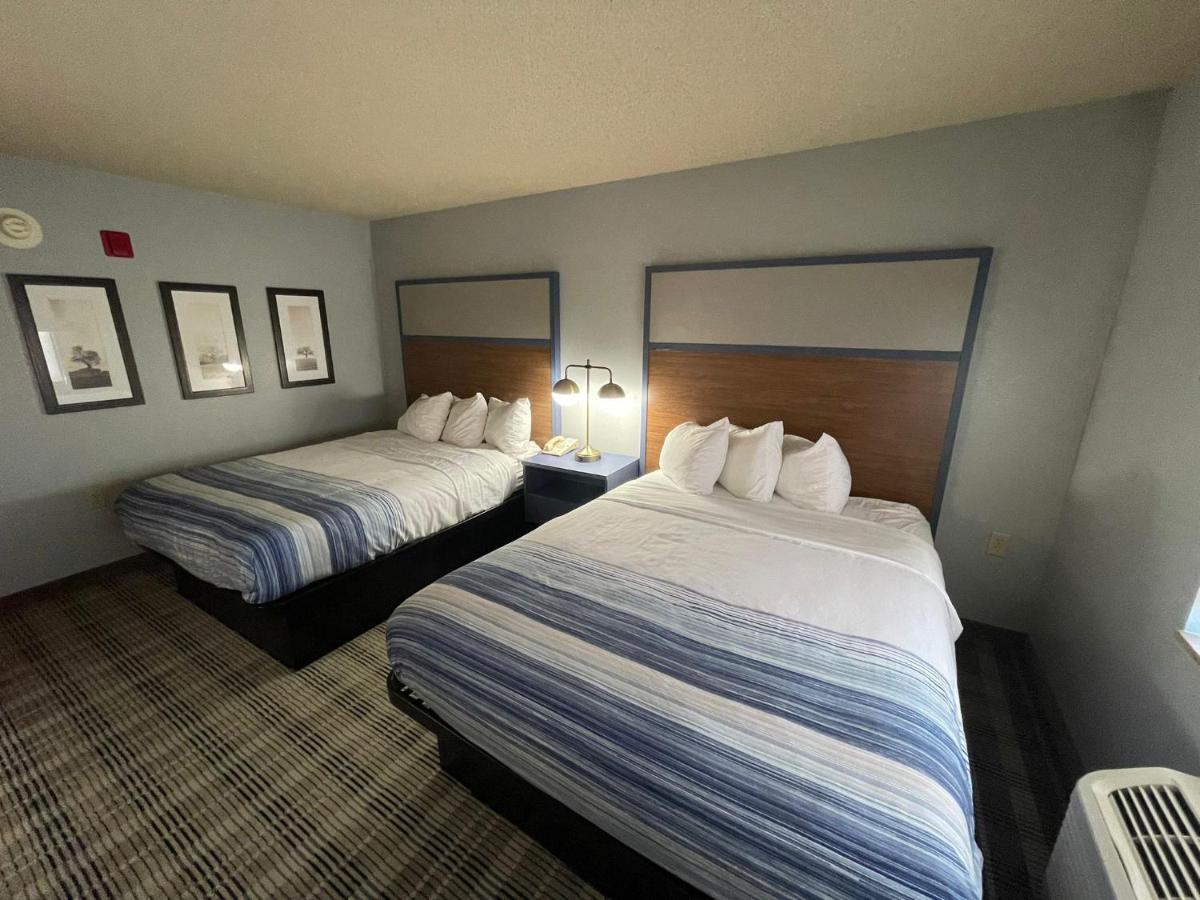 Queen Room with Two Queen Beds - Non-Smoking at AmericInn by Wyndham Sayre