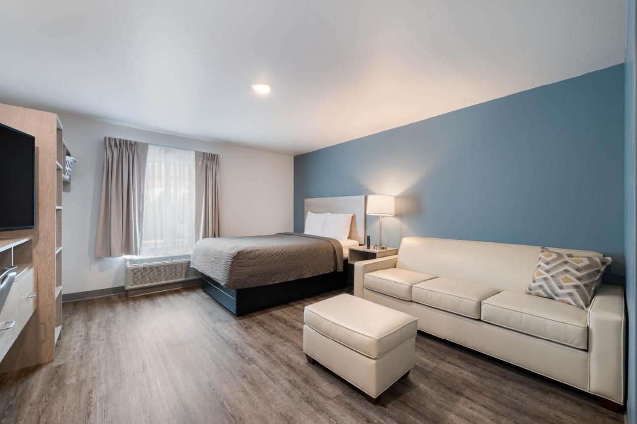 Queen Room with Sofa - Disability Access/Non-Smoking at WoodSpring Suites Concord-Charlotte Speedway