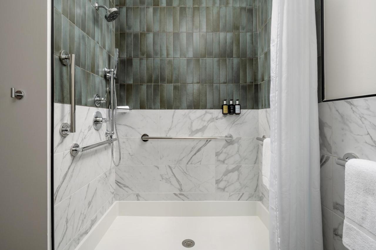Double Queen Accessible Roll In Shower at Origin Austin, A Wyndham Hotel
