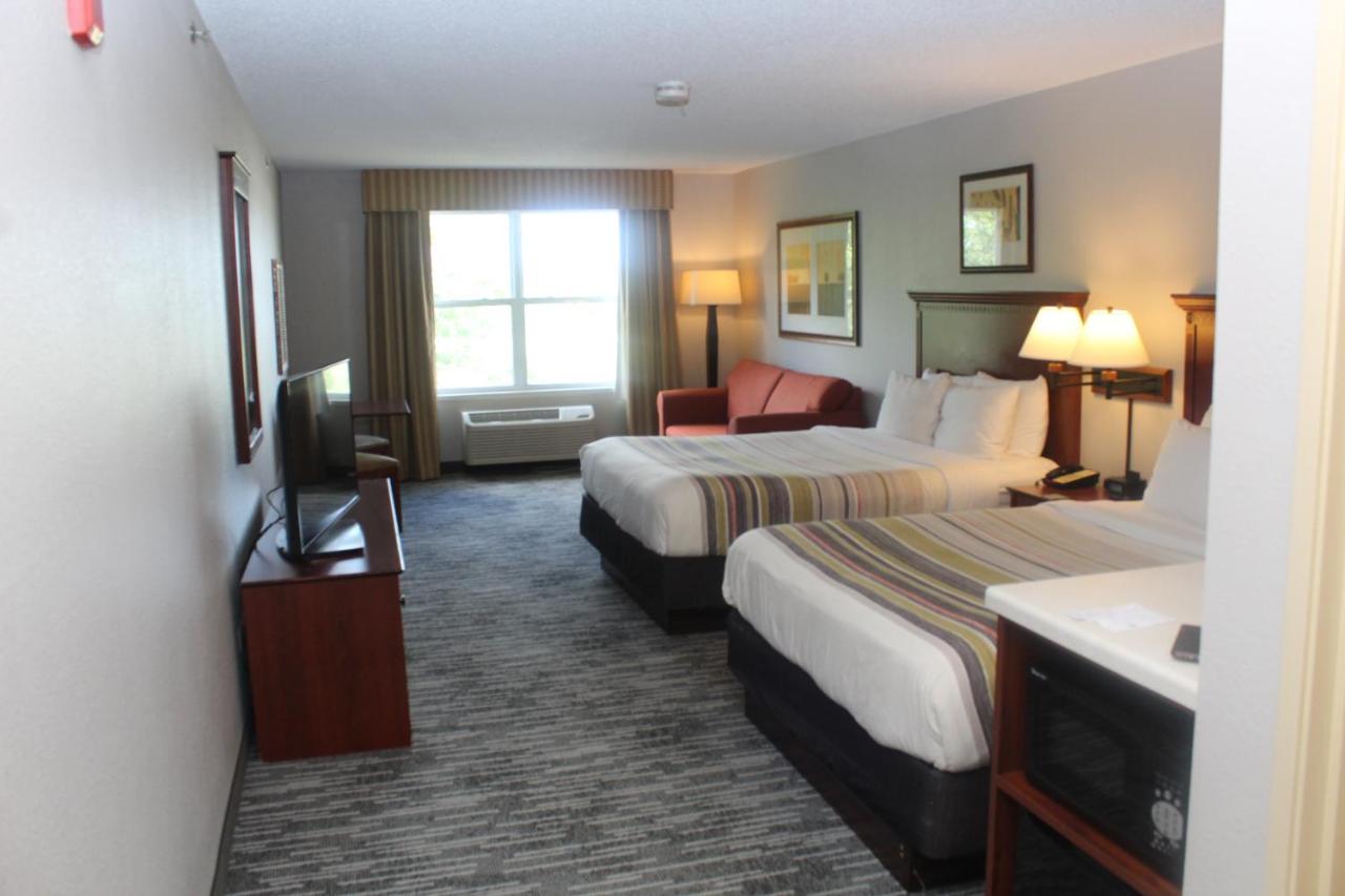 Queen Room with Two Queen Beds and Sofa Bed at Country Inn & Suites by Radisson, Crystal Lake, IL