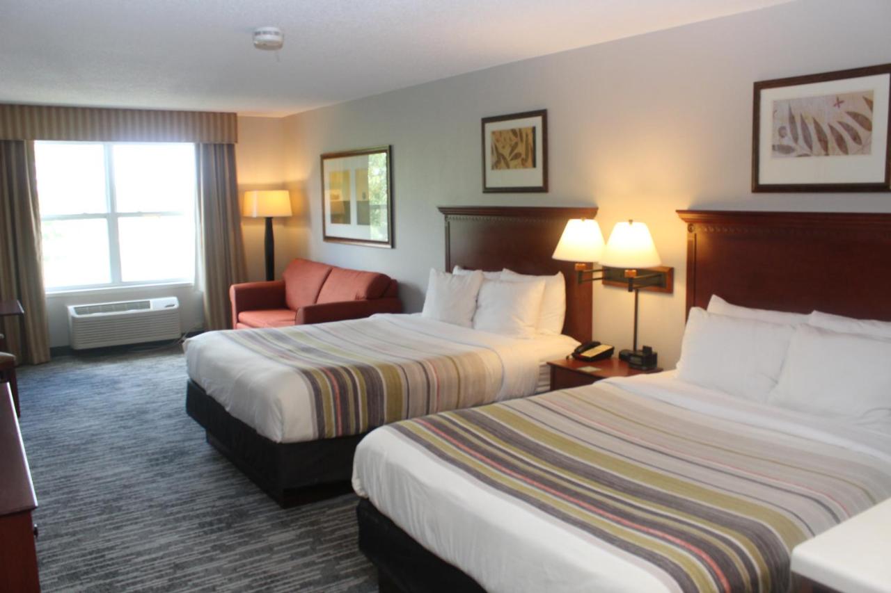 Queen Room with Two Queen Beds and Sofa Bed at Country Inn & Suites by Radisson, Crystal Lake, IL