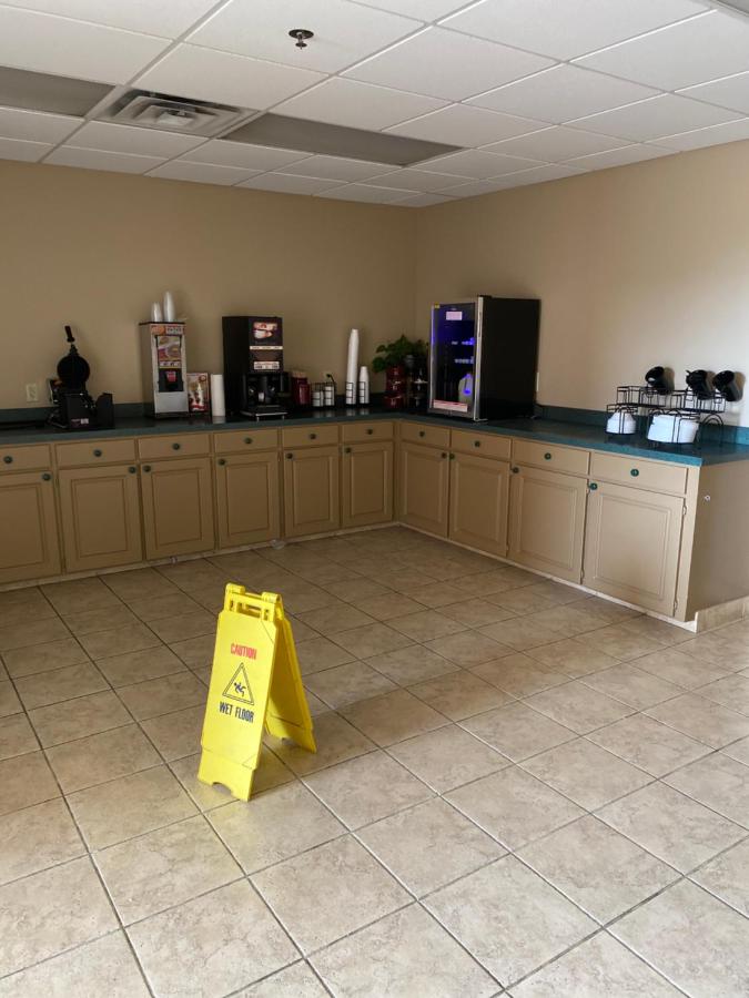 | COLLINS INN & SUITES