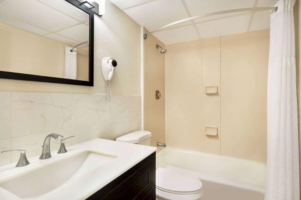 Two-Bedroom Suite with One Queen and Two Double Beds - Non-Smoking at Days Inn & Suites by Wyndham Wildwood