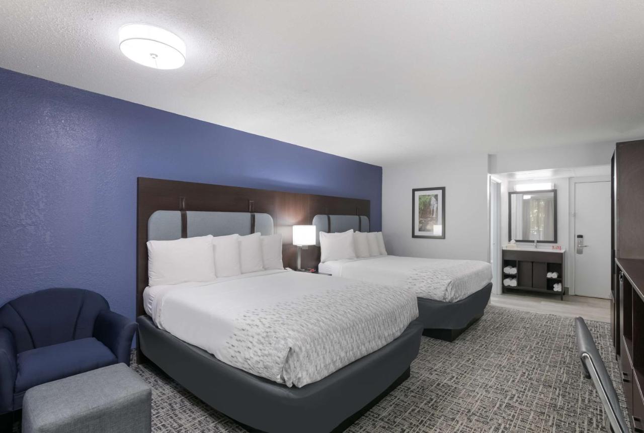 Queen Room with Two Queen Beds with Balcony at SureStay Plus Hotel by Best Western Gatlinburg