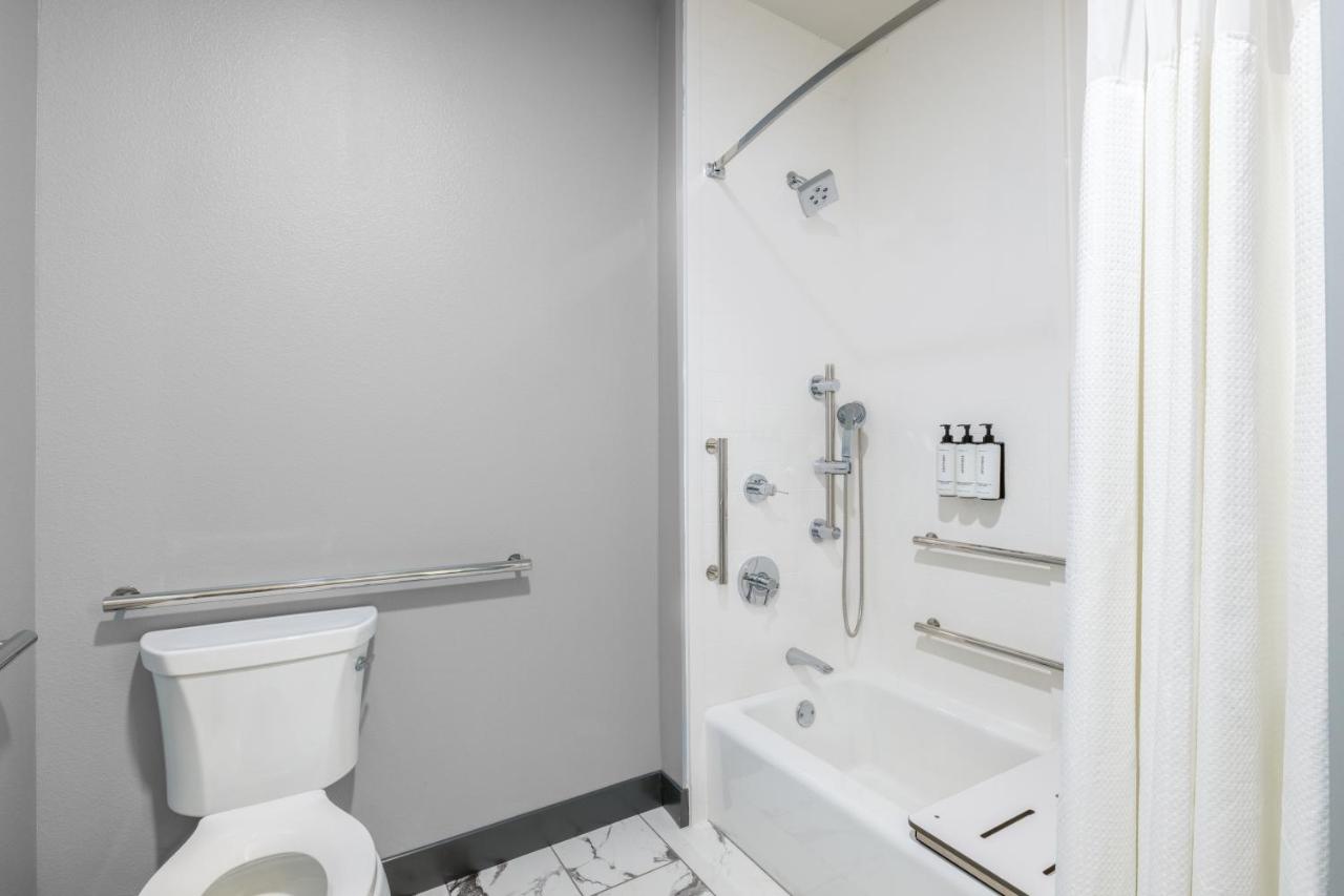 Queen Room with Two Queen Beds and Mobility Accessible Tub at Crowne Plaza Kearney, an IHG Hotel