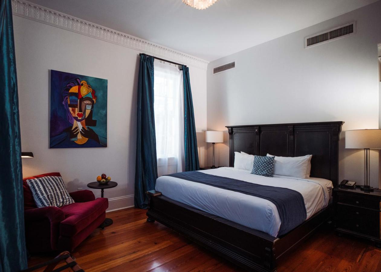 King Room with Balcony at Royal Frenchmen Hotel and Bar