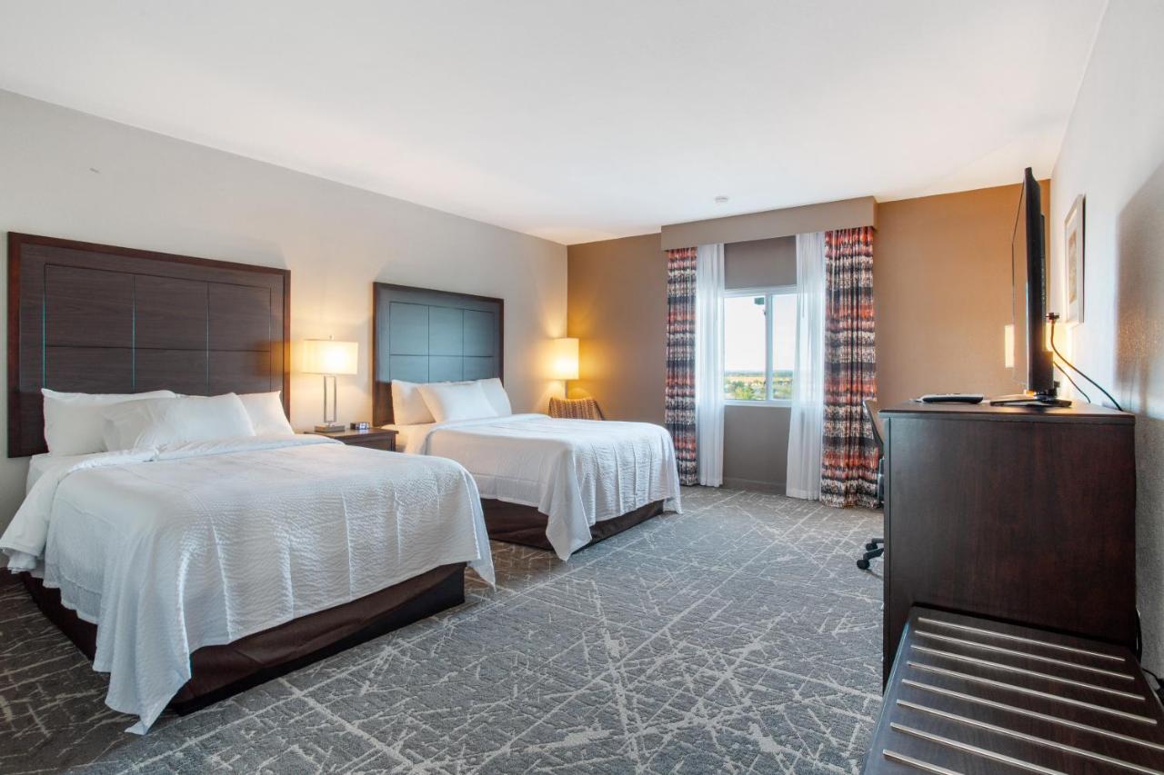 Queen Room with Two Queen Beds - Non-Smoking at Orangewood Inn & Suites Kansas City Airport