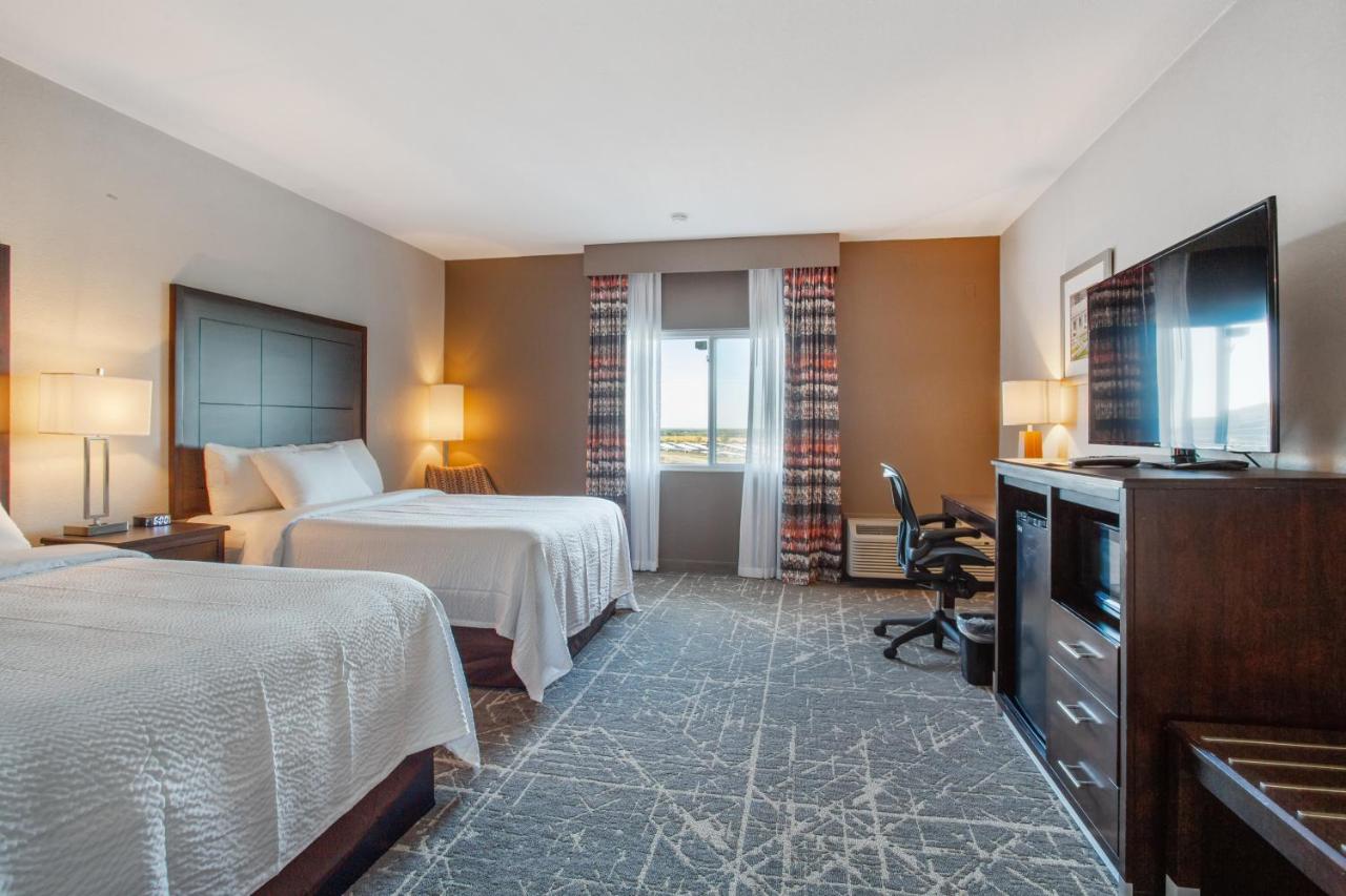 Queen Room with Two Queen Beds - Non-Smoking at Orangewood Inn & Suites Kansas City Airport