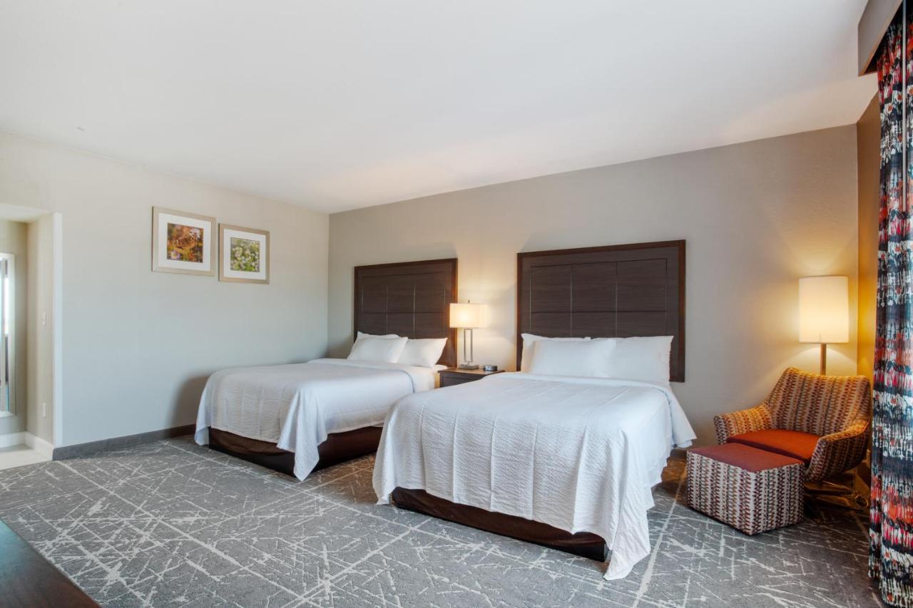 Queen Room with Two Queen Beds with Balcony - Non-Smoking at Orangewood Inn & Suites Kansas City Airport