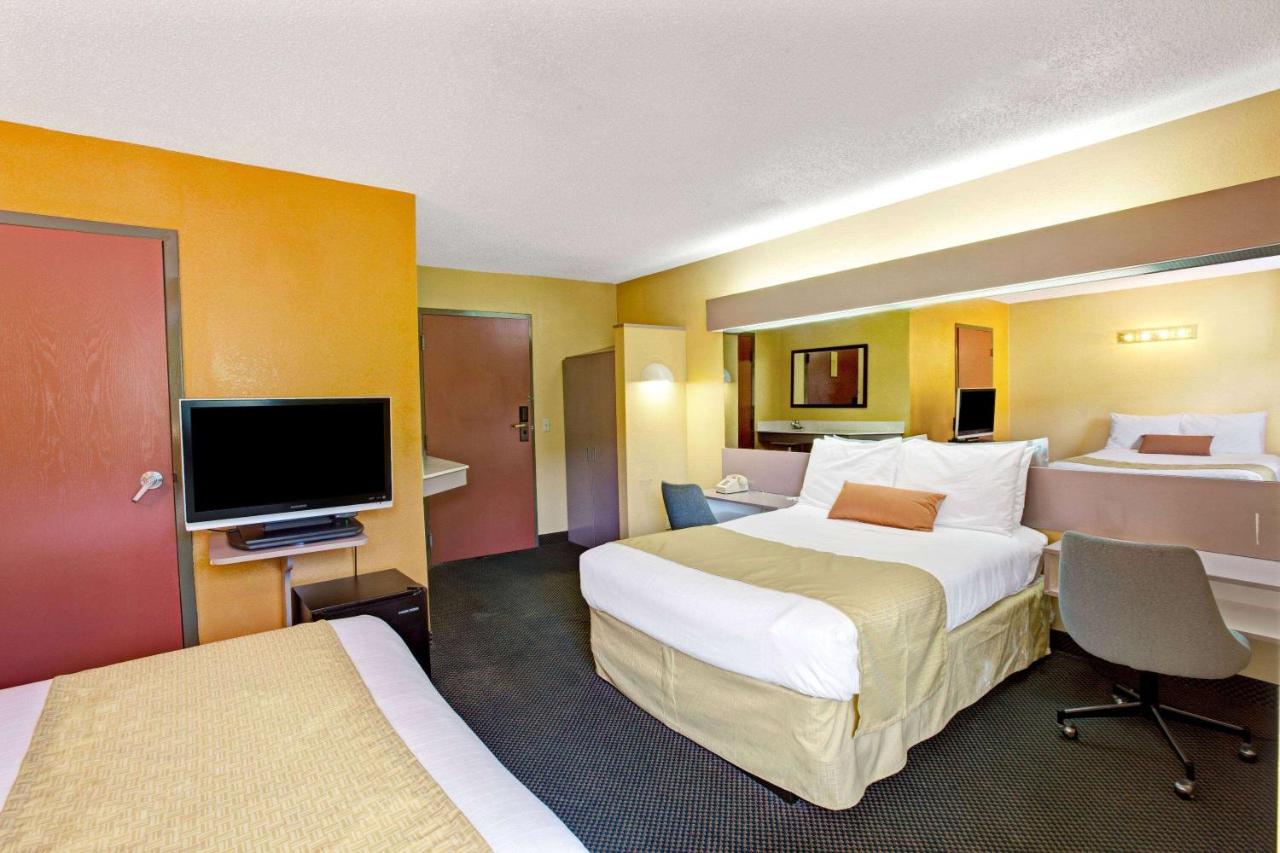 Queen Room with Two Queen Beds - Non-Smoking at Microtel Inn & Suites by Wyndham Gatlinburg
