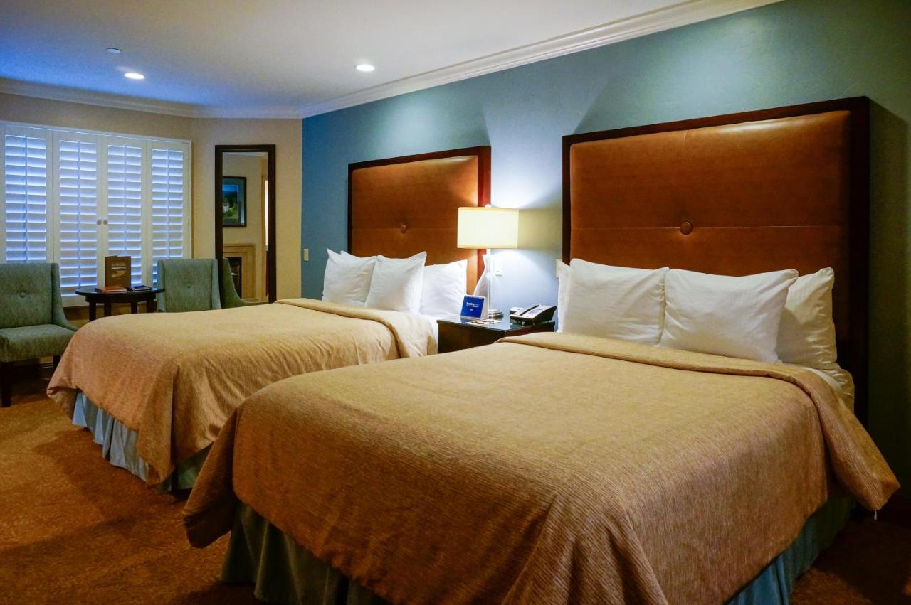 Deluxe Two Queen Beds Room at Blue Dolphin Inn