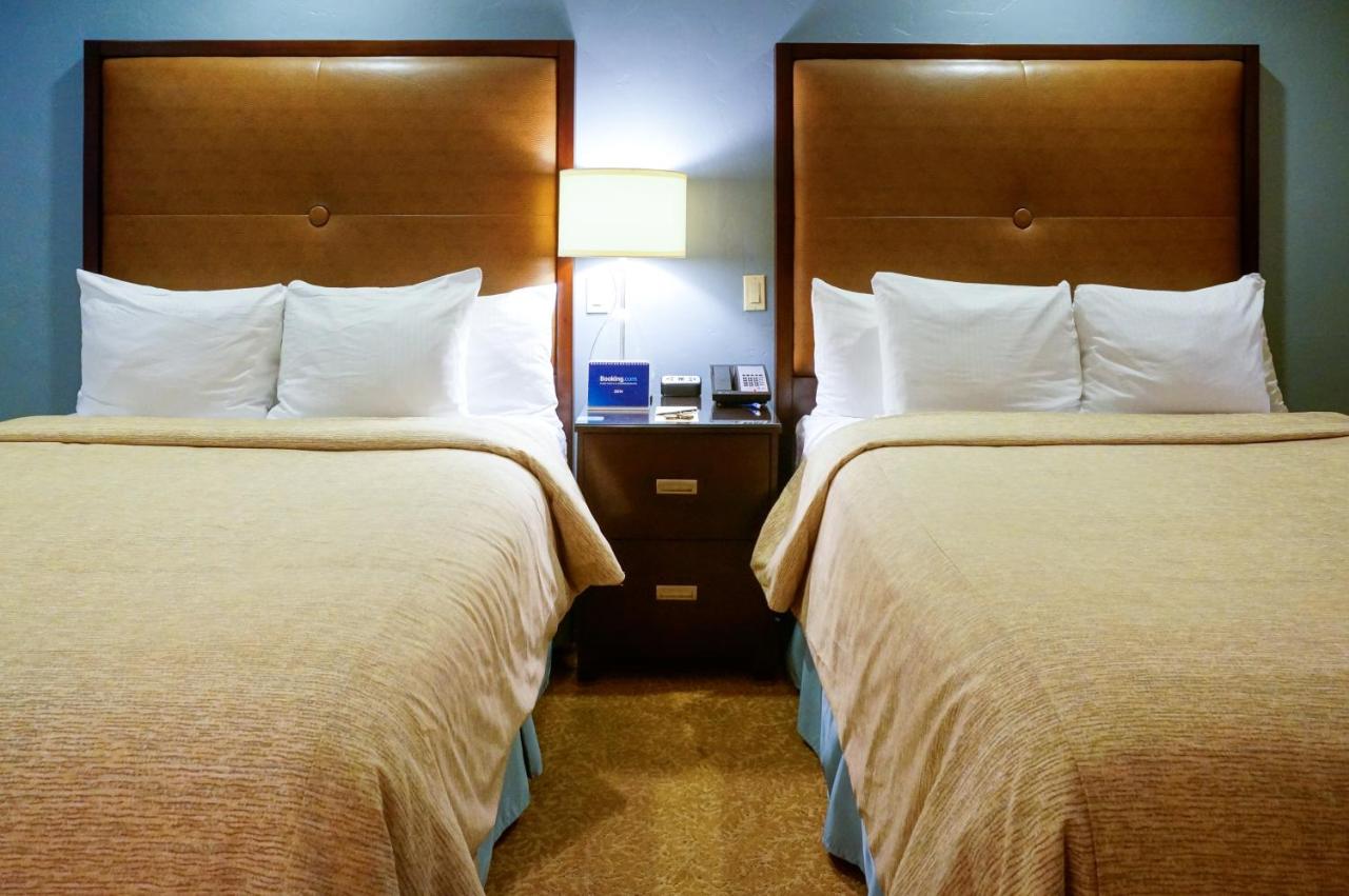 Deluxe Two Queen Beds Room at Blue Dolphin Inn