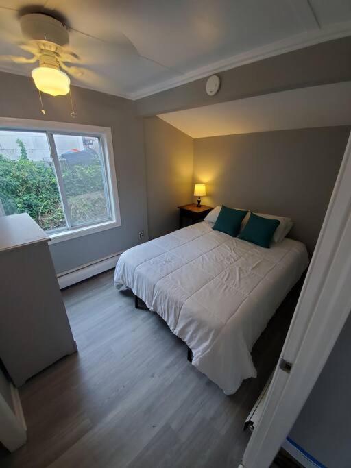  | Beachy Bay Breeze Bungalow 2BR with parking and close to many amenities.