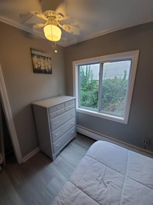  | Beachy Bay Breeze Bungalow 2BR with parking and close to many amenities.