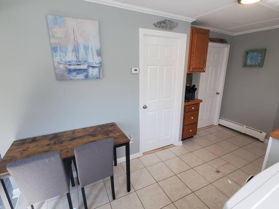  | Beachy Bay Breeze Bungalow 2BR with parking and close to many amenities.
