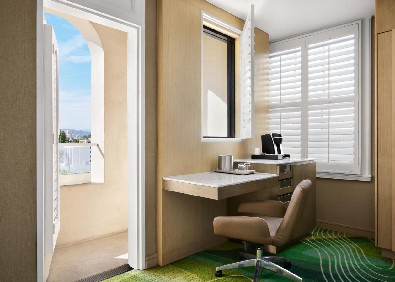 Executive Corner One King Bed with Balcony Pool View at Pasadena Hotel & Pool
