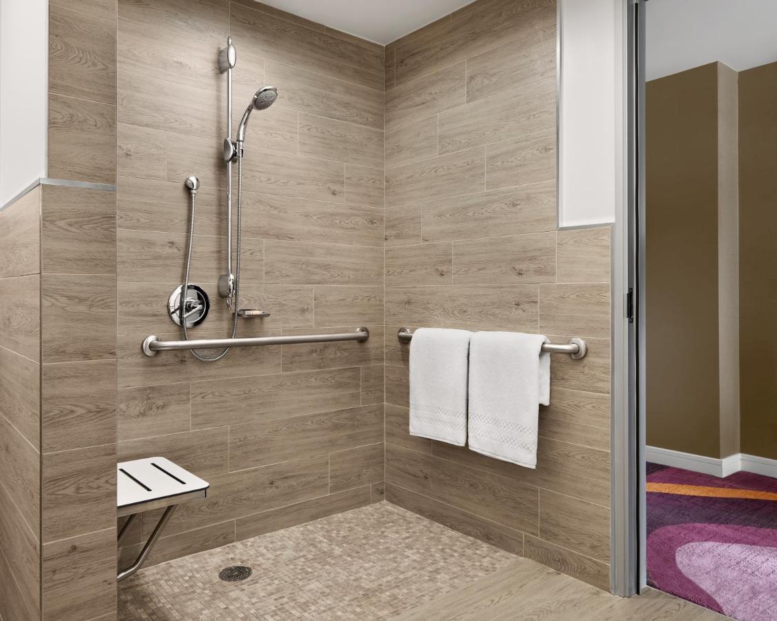 Accessible Classic One King Bed with Roll-In Shower at Pasadena Hotel & Pool