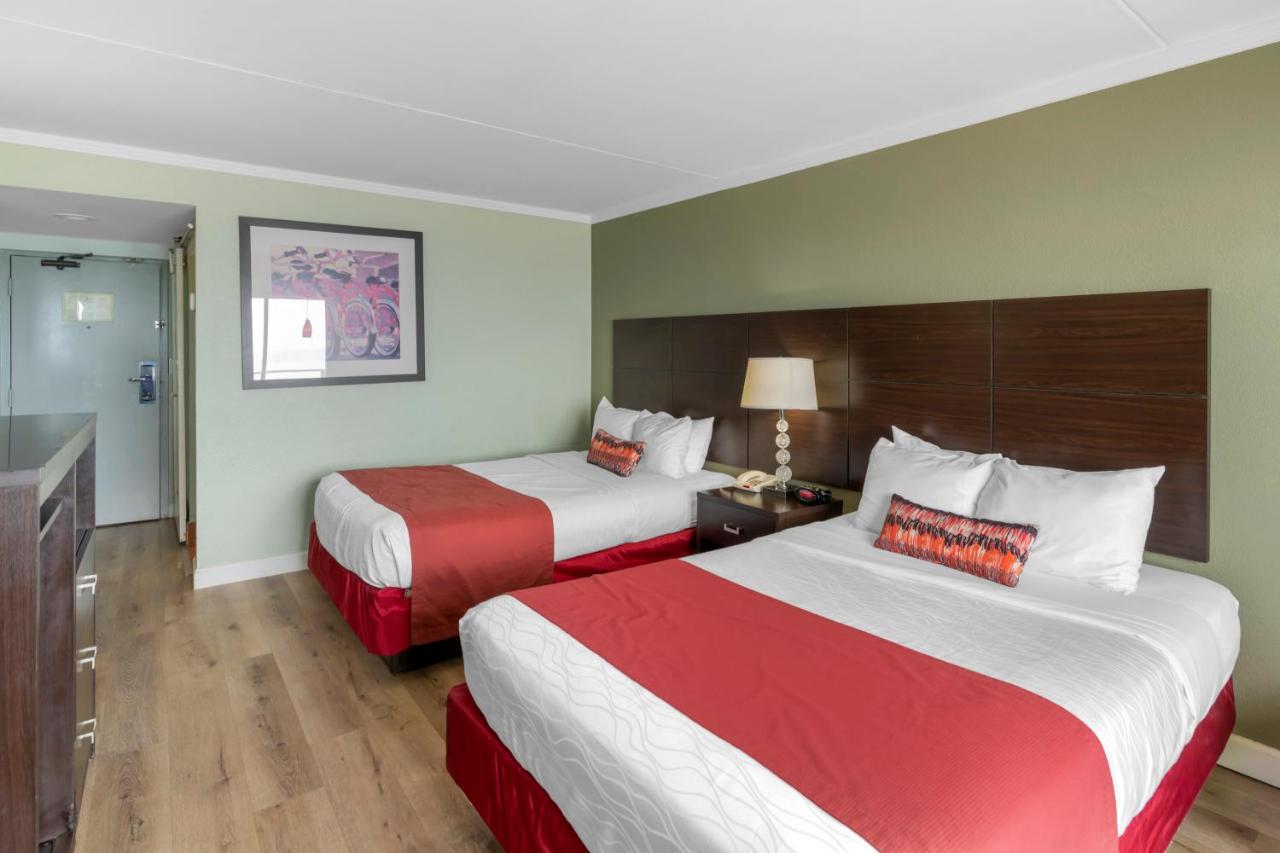 Room with Two Double Beds - Partial Ocean View at Sandcastle Resort On The Beach