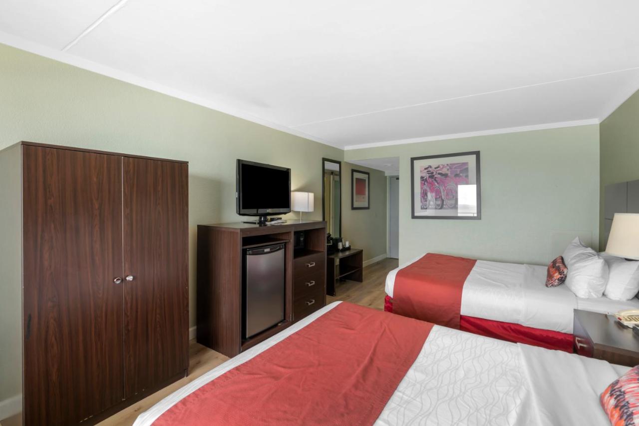 Room with Two Double Beds - Partial Ocean View at Sandcastle Resort On The Beach