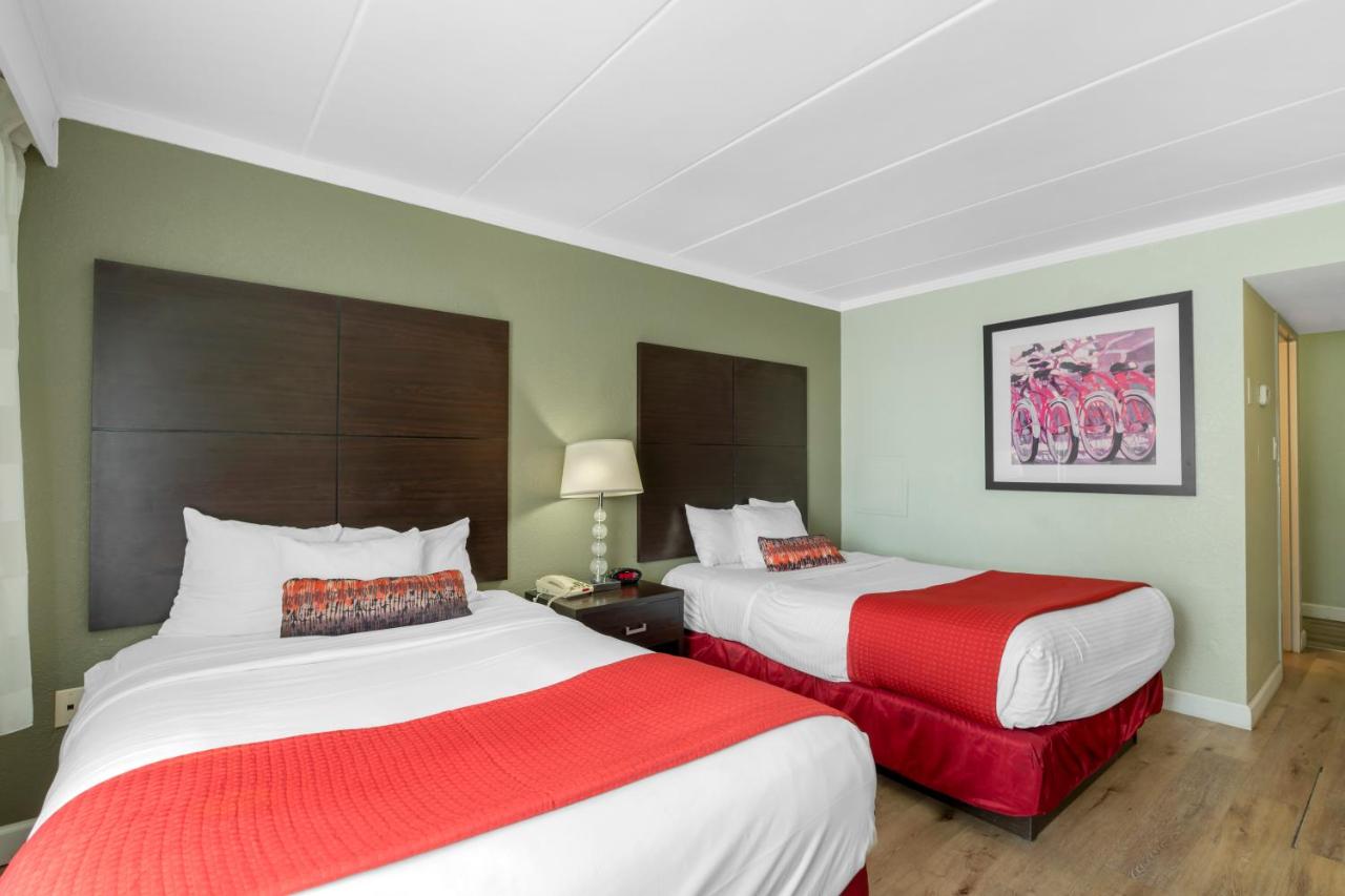 Room with Two Double Beds - Partial Ocean View at Sandcastle Resort On The Beach