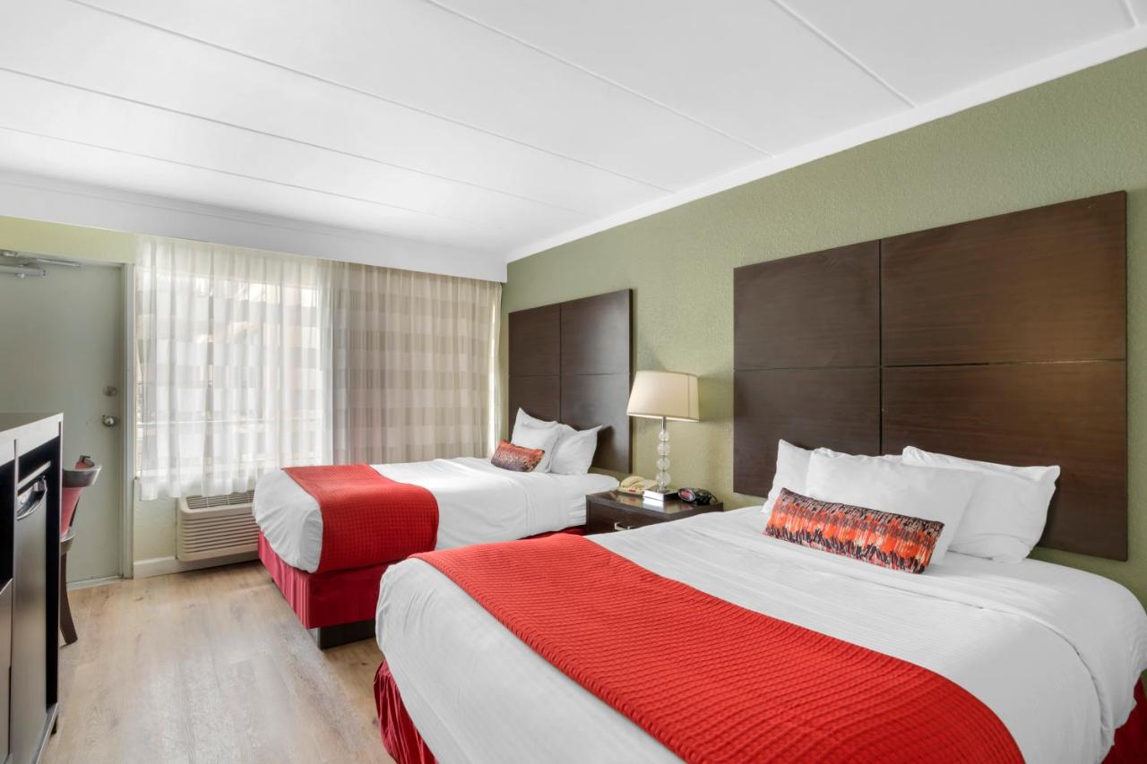 Room with Two Double Beds - Partial Ocean View at Sandcastle Resort On The Beach