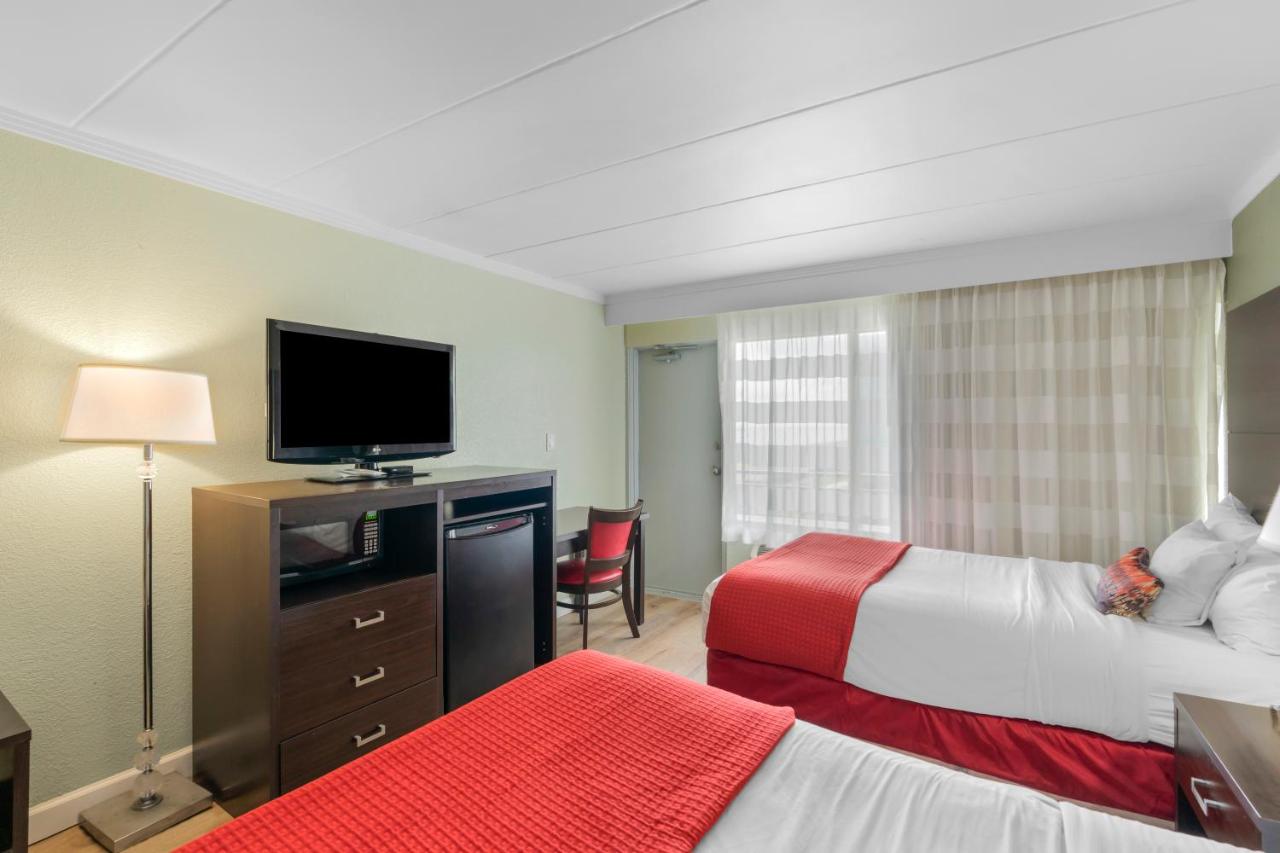 Room with Two Double Beds - Partial Ocean View at Sandcastle Resort On The Beach