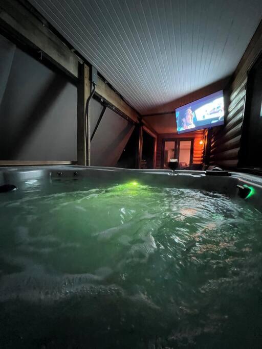 | Large Log Home on Lake with Hot Tub