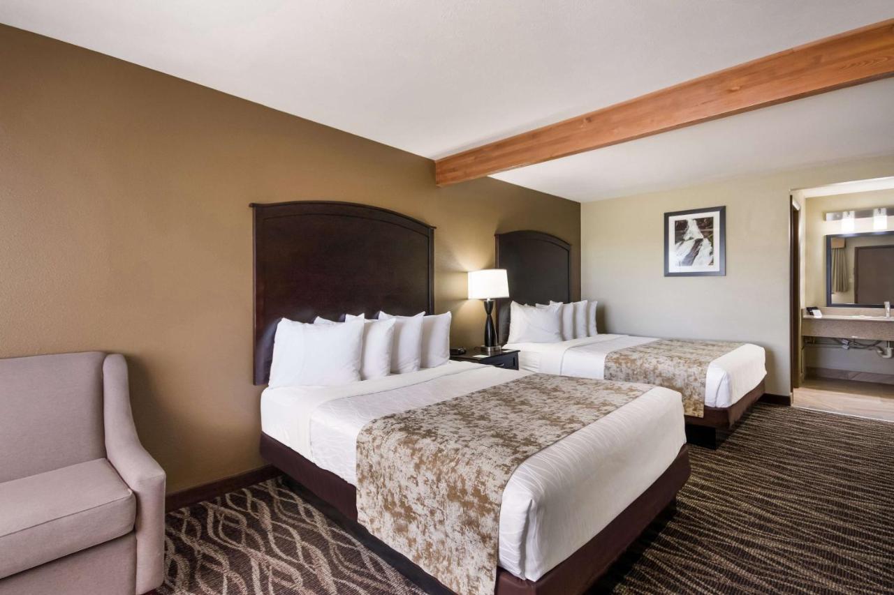 Queen Room with Two Queen Beds and Sofa Bed at Best Western Weston Inn