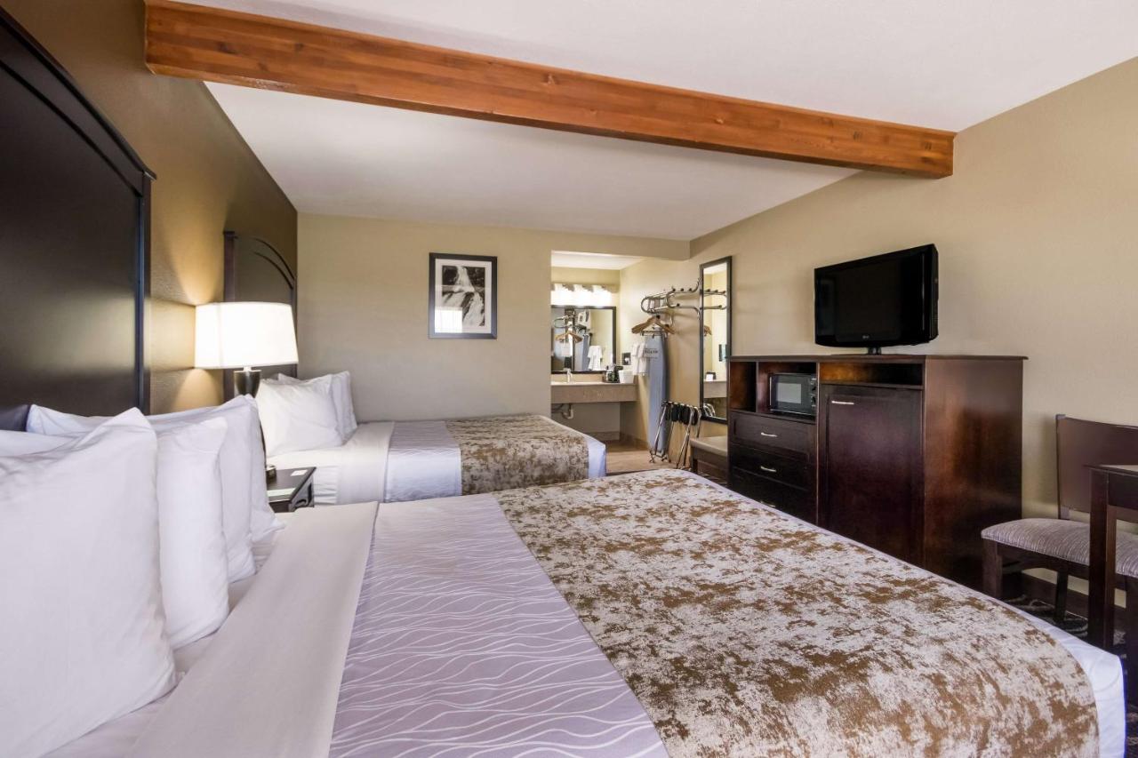 Queen Room with Two Queen Beds and Sofa Bed at Best Western Weston Inn