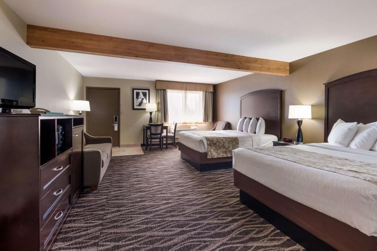 Queen Room with Two Queen Beds and Sofa Bed at Best Western Weston Inn