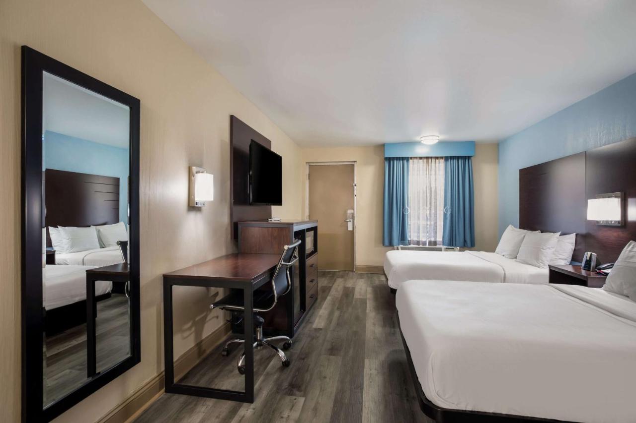 Queen Room with Two Queen Beds and Mobility Accessible Bathtub at SureStay Hotel by Best Western Bardstown General Nelson