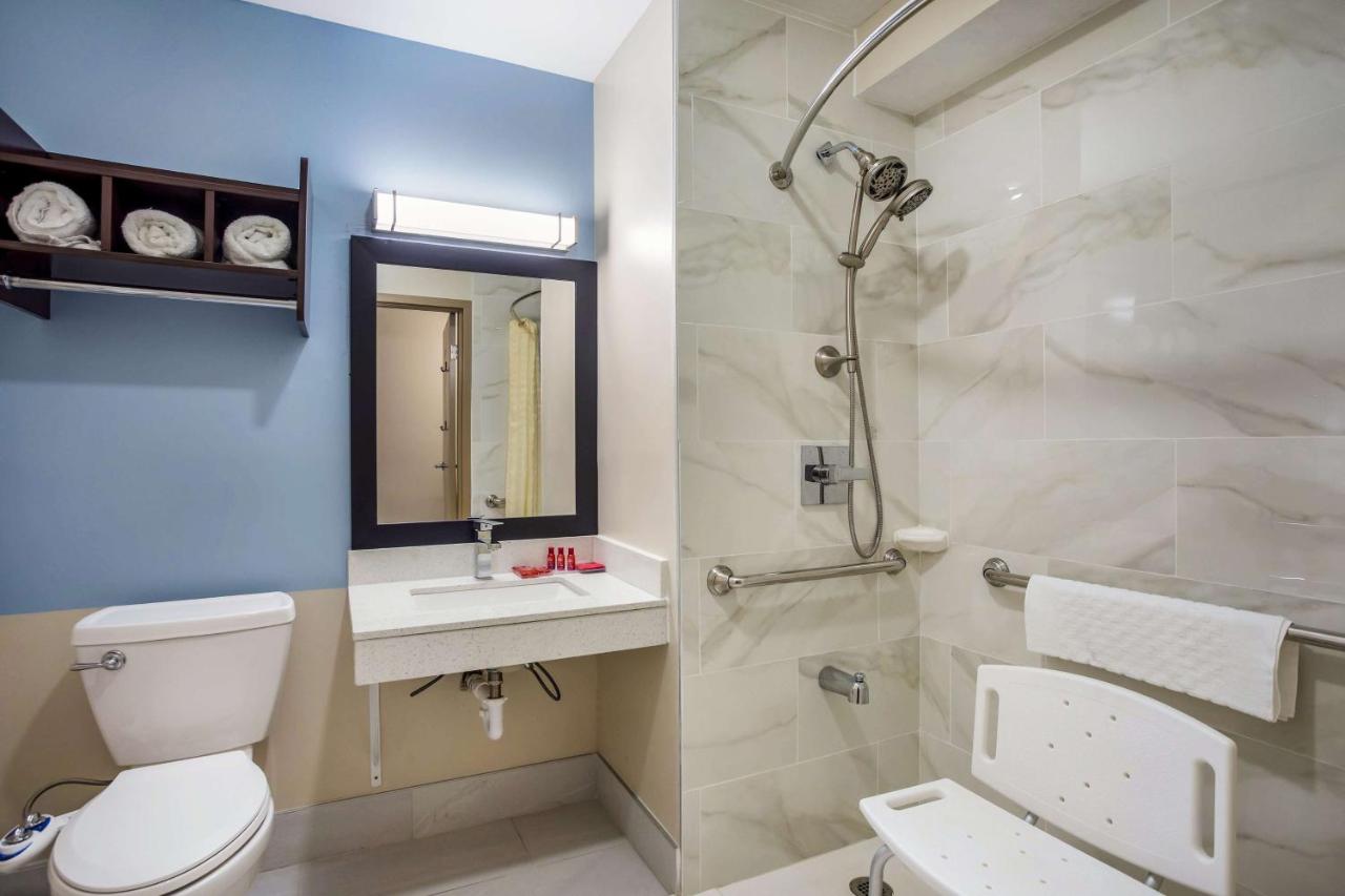 Queen Room with Two Queen Beds and Mobility Accessible Bathtub at SureStay Hotel by Best Western Bardstown General Nelson