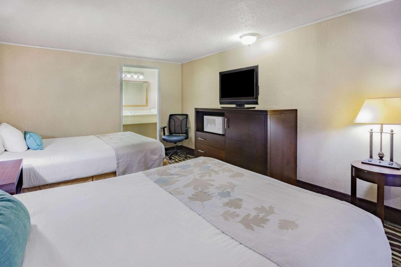 Queen Room with Two Queen Beds - Non-Smoking at Travelodge by Wyndham Monroe