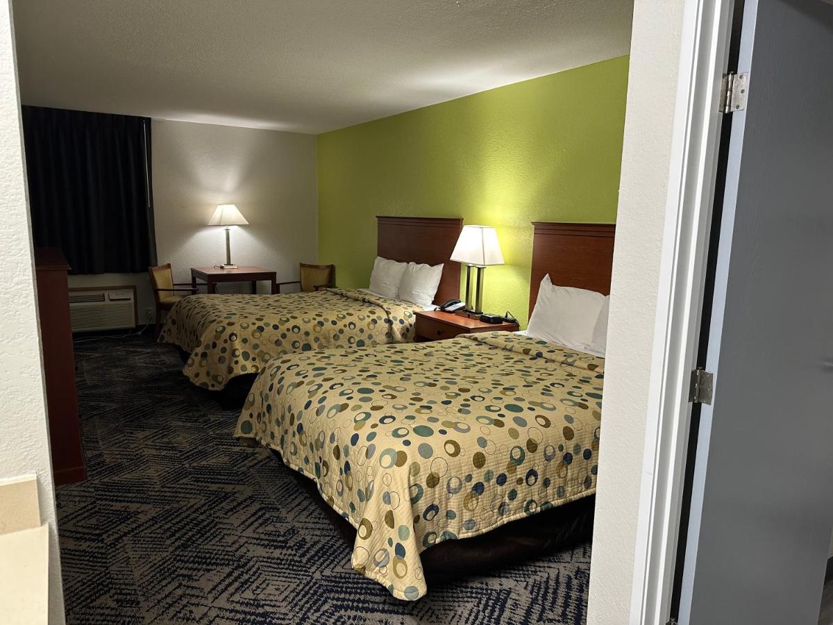 Queen Room with Three Queen Beds - Non-Smoking at Baymont by Wyndham Omaha SW