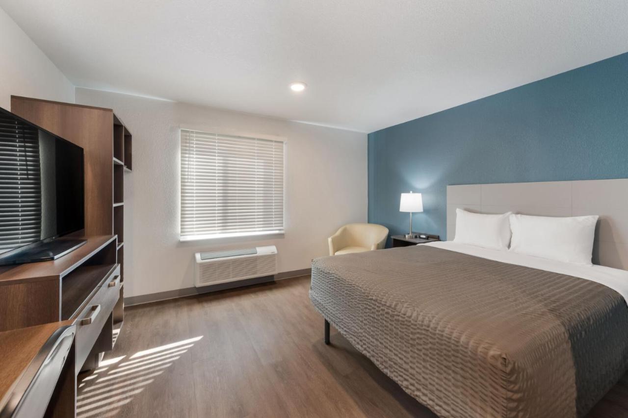 Queen Room with Roll-In Shower - Accessible/Non Smoking at Woodspring Suites Dayton North