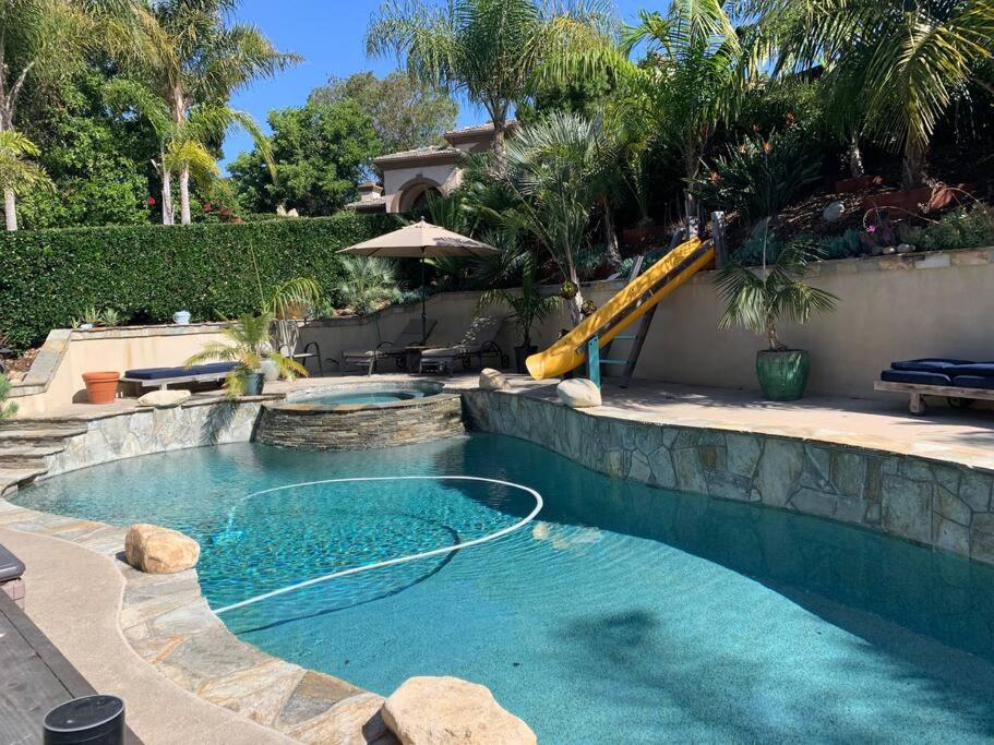 | Tropical Paradise w/ hot tub and heated pool