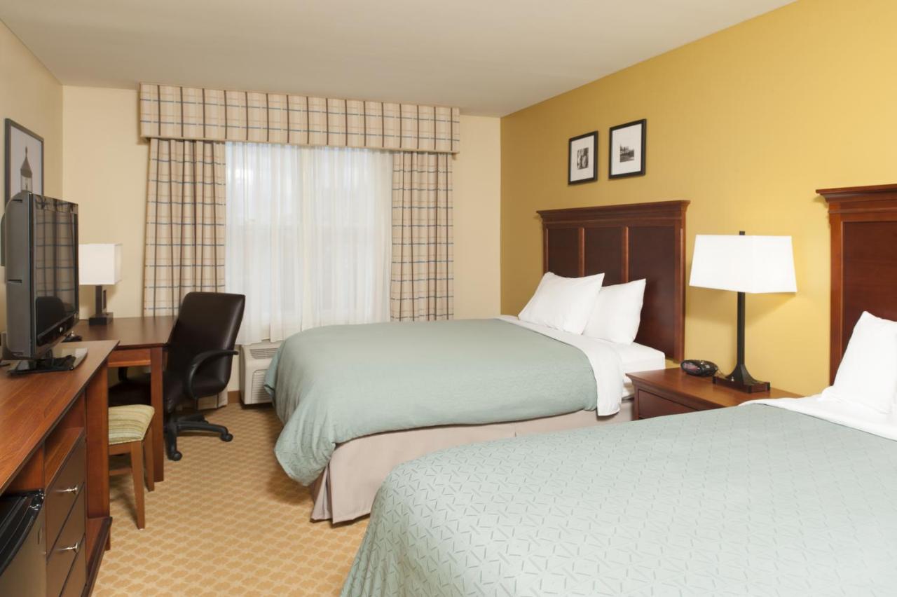 Queen Room with Two Queen Beds at Country Inn & Suites by Radisson, Holland, MI