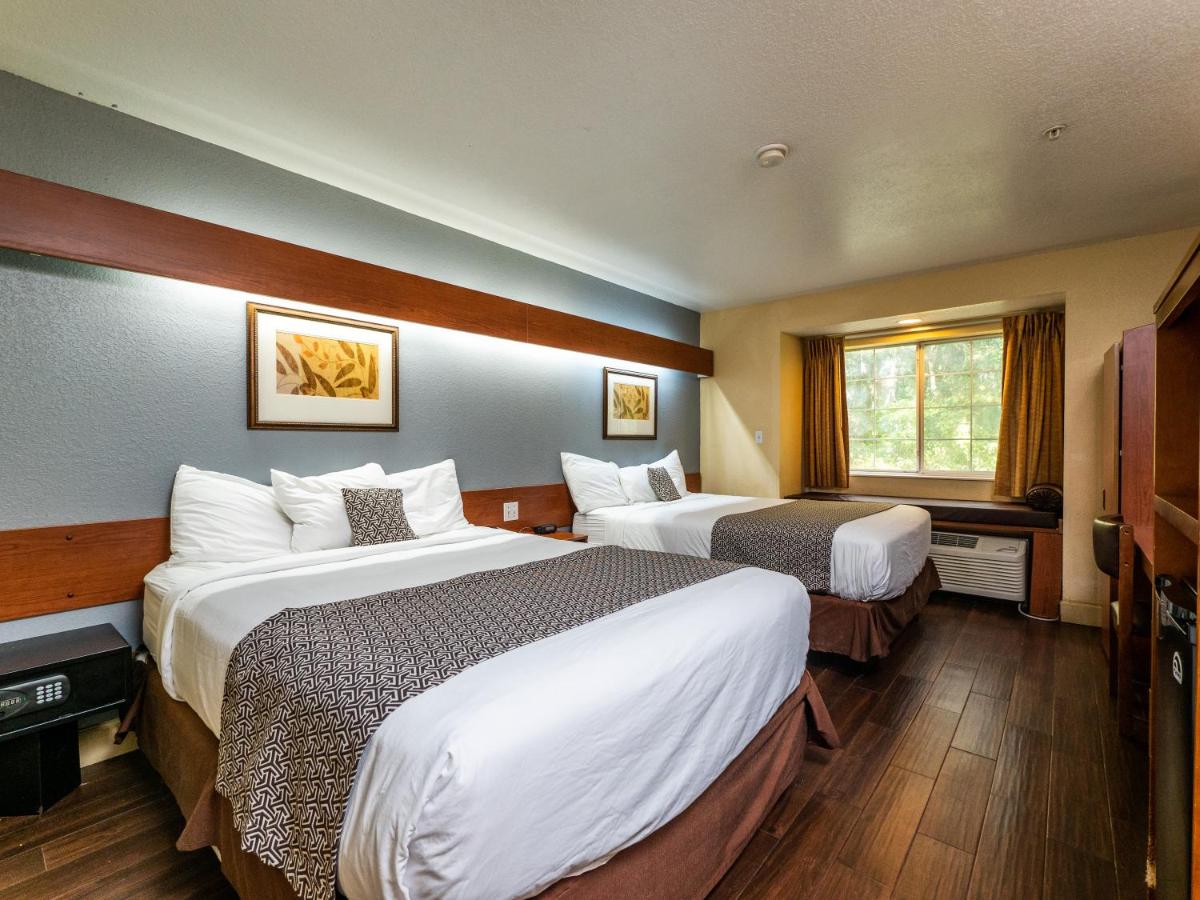 Deluxe Queen Room with Two Queen Beds - Non-Smoking at Microtel Inn & Suites by Wyndham Ocala