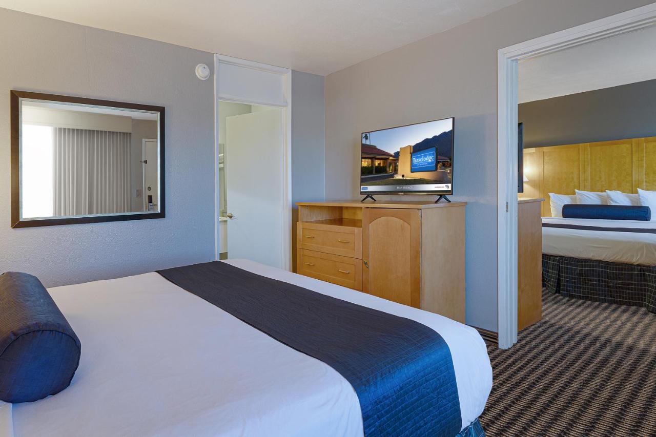 King Suite with One King and One Queen Bed - Non-Smoking at Travelodge by Wyndham Palm Springs