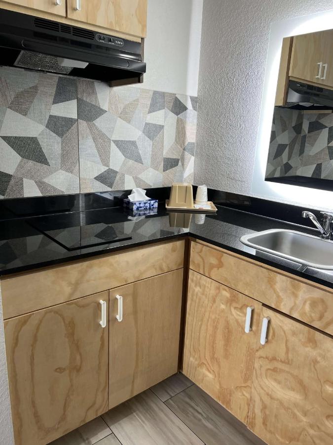 Double Room with Two Double Beds and Kitchenette at SureStay Hotel by Best Western Spring North Houston