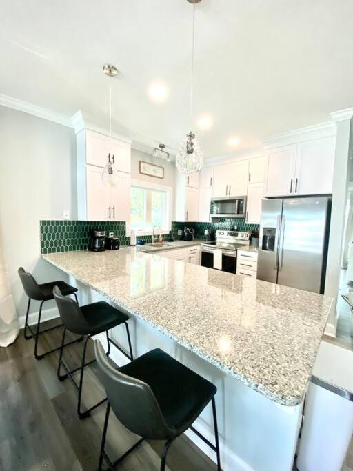 | Henderson Haven 4 BR / 3 BA Villa, Steps to Beach
