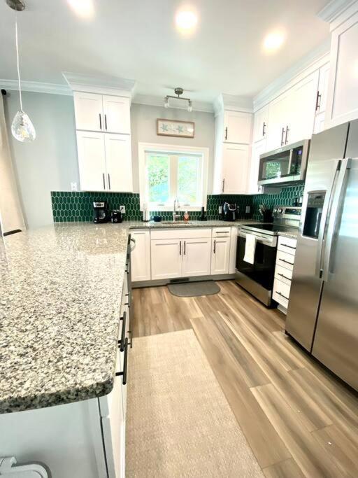 | Henderson Haven 4 BR / 3 BA Villa, Steps to Beach