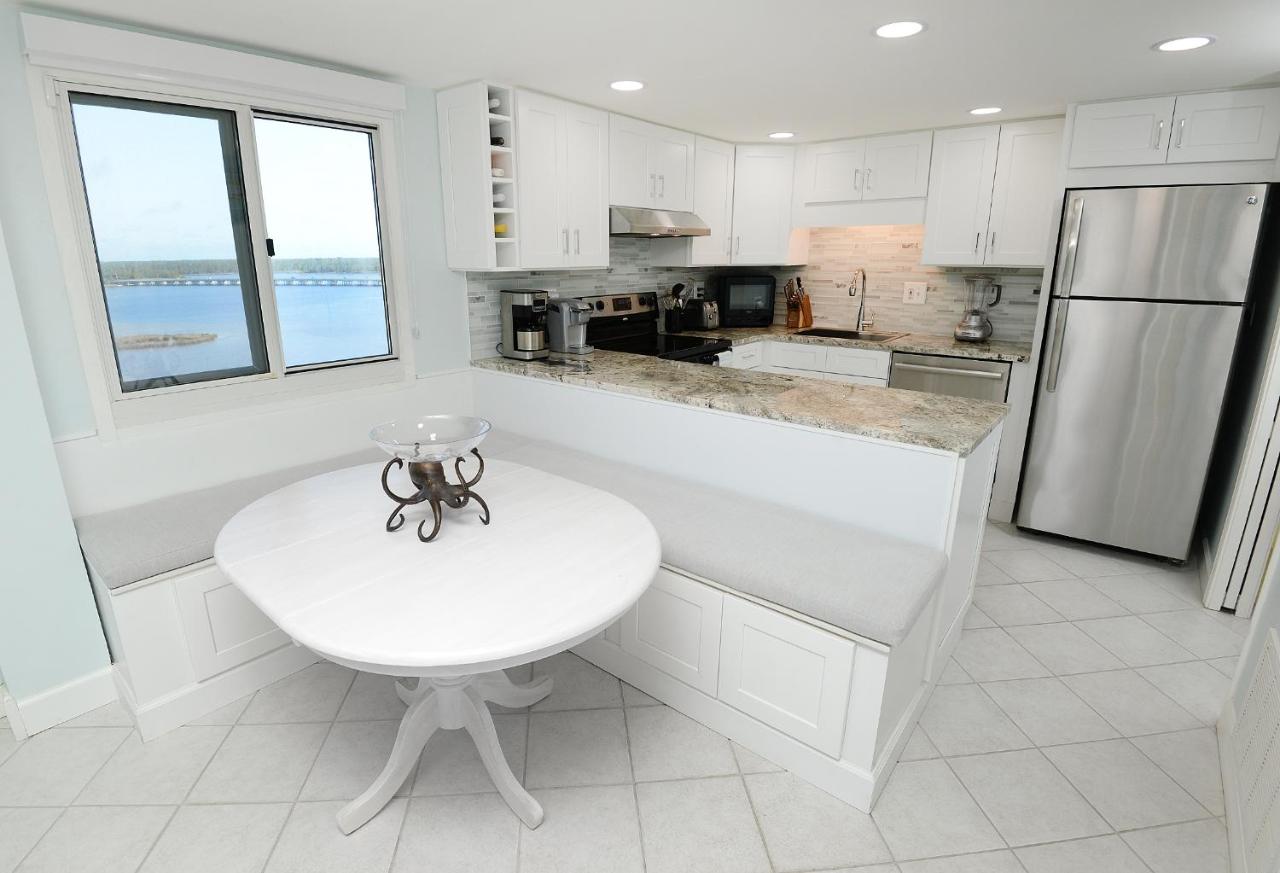 | Gulf-front and Lake-Front bliss with 2 balconies at Pinnacle Port Resort